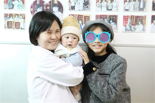 彝族阿依在何庆医生帮助下如愿好孕